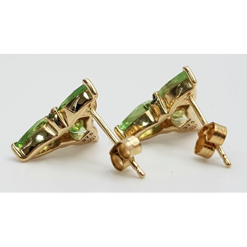 964 - A Pair of 9K Yellow Gold Tsavorite and Green Diamond Earrings. 2.53g total weight.