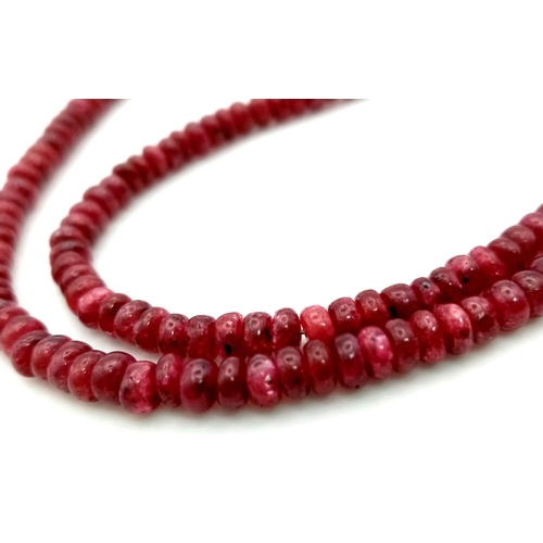 1052 - A 97ct Single Strand cabochon ruby gemstone necklace with 925 silver clasp. 44cm.