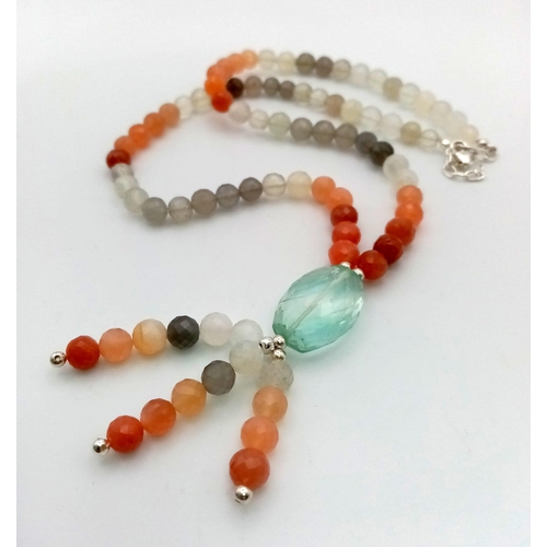 1241 - A 150ct Moonstone tumble bead necklace with a Green amethyst tumble drop - 6 and 42cm.