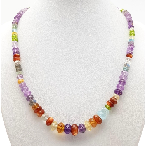 1281 - A multi-gemstone necklace with Citrine, amethyst, peridot, carnelian and  garnet beads, with a 925 s... 