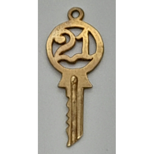 1293 - A 9K Yellow Gold 21 Key Pendant or Charm. 22mm. 0.83g