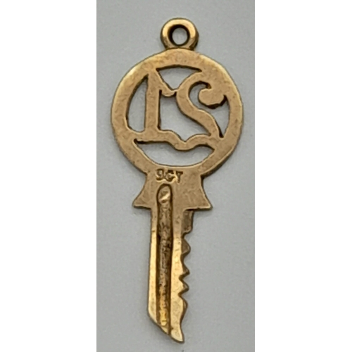 1293 - A 9K Yellow Gold 21 Key Pendant or Charm. 22mm. 0.83g