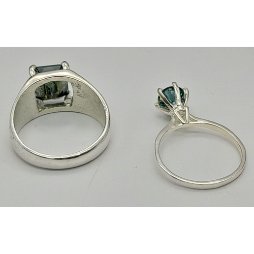 1296 - His and Hers 3.90ct Emerald Cut Blue Moissanite ring and a 1.10ct Blue Moissanite Ring. Both set in ... 