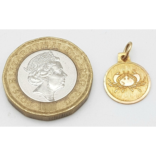 1297 - A 9K Yellow Gold Sagittarius Pendant or Charm. 11mm diameter. 0.6g