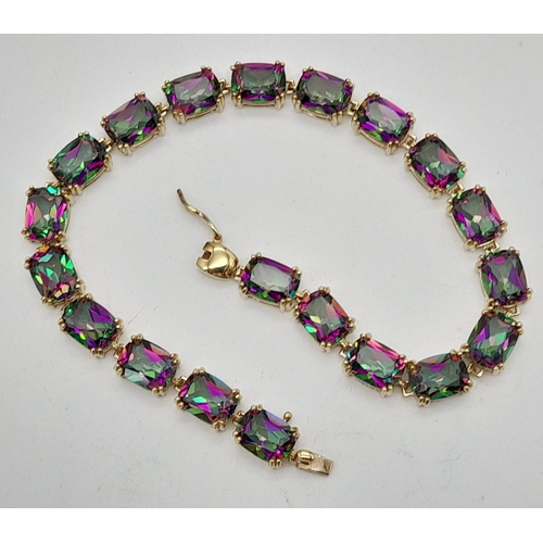 136 - A 9K Yellow Gold Mystic Topaz Tennis Bracelet. 20cm. 14.2g total weight.