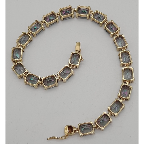 136 - A 9K Yellow Gold Mystic Topaz Tennis Bracelet. 20cm. 14.2g total weight.