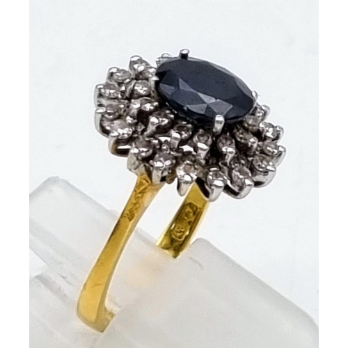 198 - A Beautiful Vintage 18K Yellow gold Sapphire and Diamond Ring. Large central sapphire surrounded by ... 