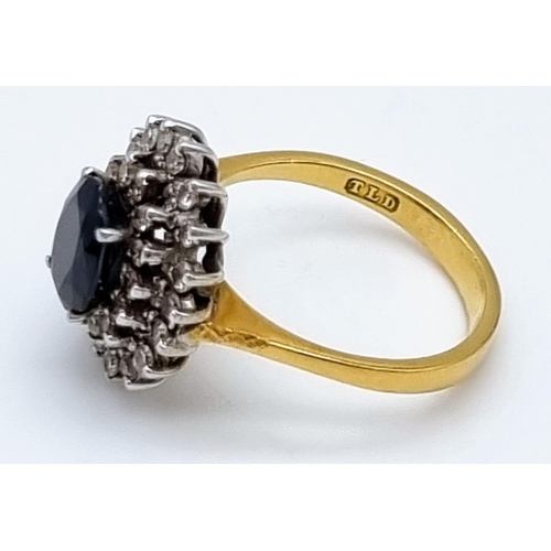 198 - A Beautiful Vintage 18K Yellow gold Sapphire and Diamond Ring. Large central sapphire surrounded by ... 