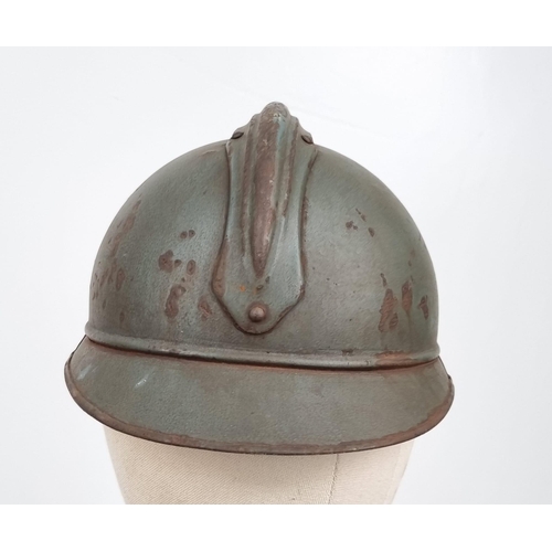 369 - A WW1 French 1915 Model Infantry Adrian Helmet with liner.