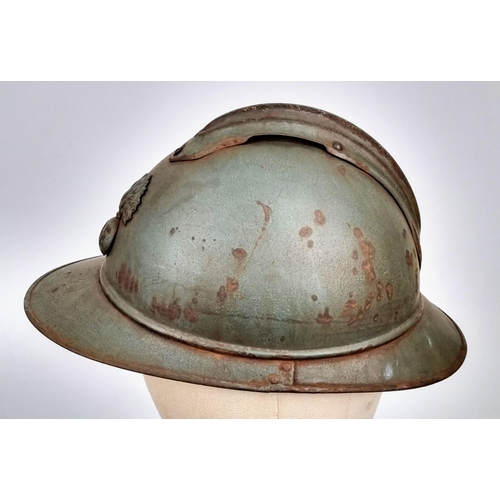 369 - A WW1 French 1915 Model Infantry Adrian Helmet with liner.