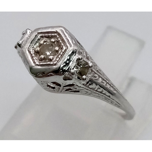 578 - A Vintage White Gold Diamond Ring. Size I 1/2. 1.5g total weight.