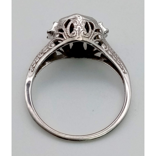 578 - A Vintage White Gold Diamond Ring. Size I 1/2. 1.5g total weight.