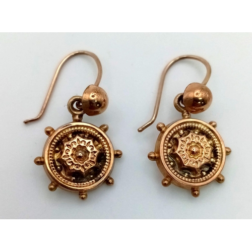 612 - A Pair of 9K Yellow Gold Victorian Nautical Ship Wheel/Helm Earrings. 2.16g total weight.