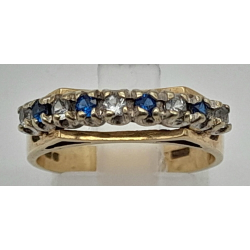 886 - A Vintage 9K Blue and White Stone Half-Eternity Ring. Size N. 3.51g total weight.