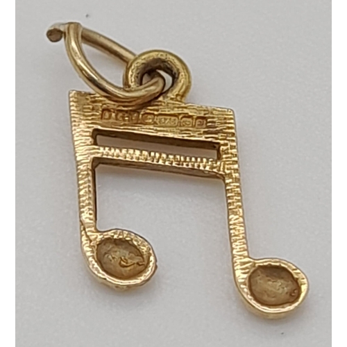 912 - A 9K Yellow Gold Musical Note Pendant or Charm.10mm.