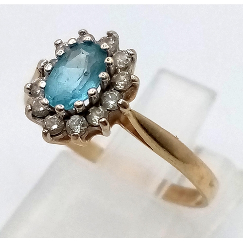 953 - A Vintage 9k Yellow Gold Topaz and White Stone Cluster Ring. Size P. 1.63g total weight.