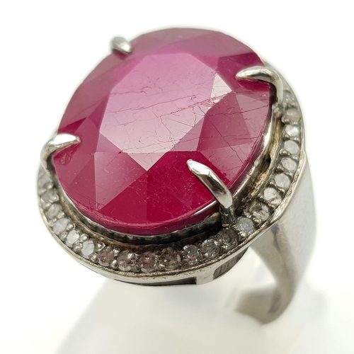 1280 - A 15.10ct Ruby Gemstone Ring - with .36ct Diamonds in a halo setting. 925 Silver. 8g total weight. S... 