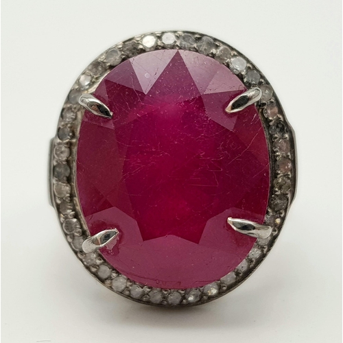 1280 - A 15.10ct Ruby Gemstone Ring - with .36ct Diamonds in a halo setting. 925 Silver. 8g total weight. S... 