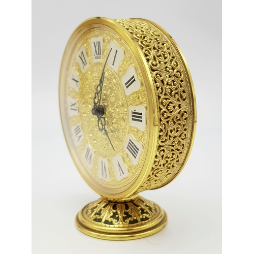 396 - A Vintage (circa 1970) Jaeger Lecoultre Table/Desk Clock. A Beautifully gilded ornate timepiece. Sit... 