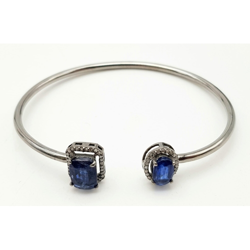 619 - A 6.10ct Kyanite Gemstone Open Bracelet - with .40ct of diamonds. 11.26g total weight.