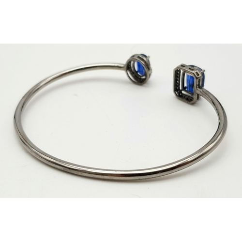 619 - A 6.10ct Kyanite Gemstone Open Bracelet - with .40ct of diamonds. 11.26g total weight.