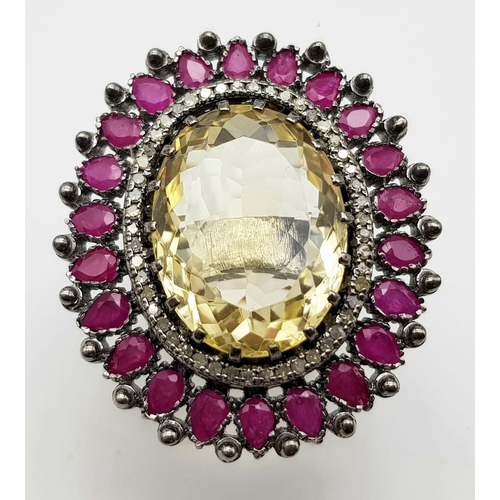 1144 - A 16.55ct Citrine Gemstone Ring - with Rubies and Diamonds in a halo setting. Total gemstone weight ... 