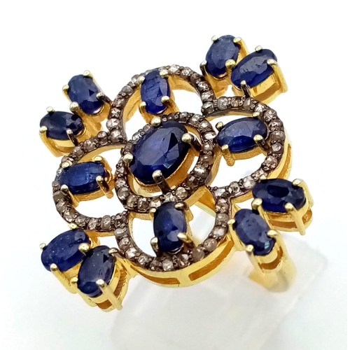 1146 - A Blue Sapphire Cocktail Ring with  .70ct of diamond accents. Size P. 8.2g total weight.