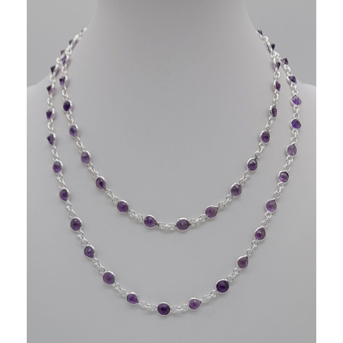 1160 - An Amethyst Gemstone long chain necklace set in 925 silver. 72cm.