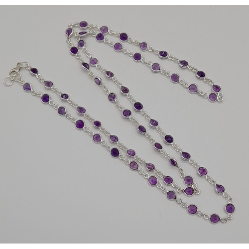 1160 - An Amethyst Gemstone long chain necklace set in 925 silver. 72cm.