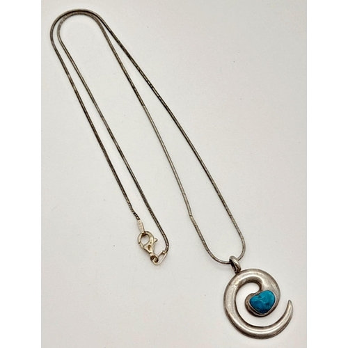 1322 - A Sterling Silver Turquoise Set Swirl Pendant on a 925 Snake Link Chain. 25mm and 40cm.