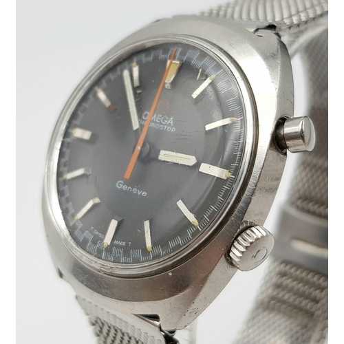 1154 - A gents OMEGA CHRONOSTOP stainless steel gents watch. Case width: 35 mm, grey face, Swiss made, mech... 