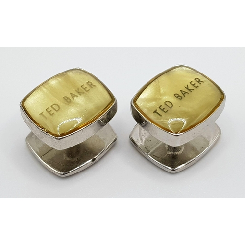 1237 - A white metal (untested) TED BAKER cufflinks.