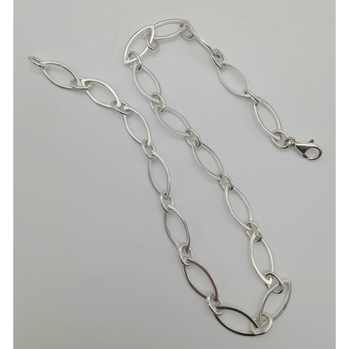 1109 - A STERLING SILVER FANCY LINK OVAL NECKLACE. 20gms  40cms