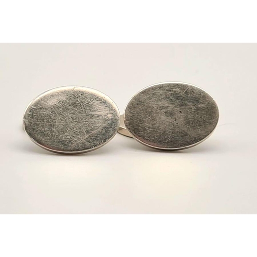 1102 - A sterling silver Chian cufflinks engraved LAURICK jewellers THFC TOTTENHAN SPURS . Weight: 17.2 g.