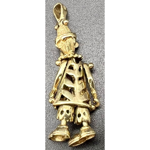 814 - 9K YELLOW GOLD STONE SET ARTICULATED CLOWN PENDANT, WEIGHT  5.5G AND DROP 4CM APPROX