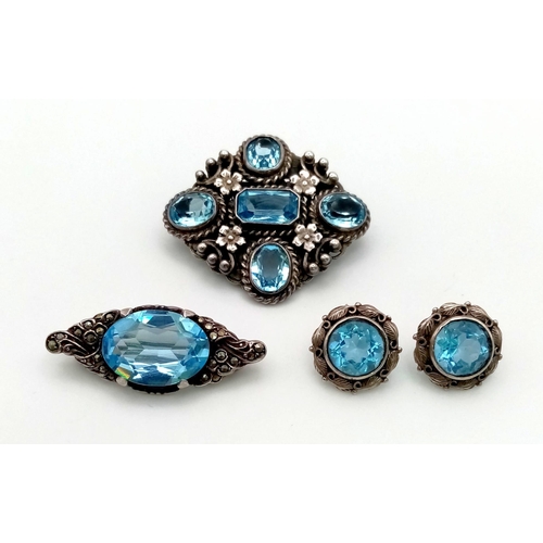 1476 - A Hypnotising Art Deco Blue Gemstone Jewellery Suite. Comprising of earrings and two brooches set in... 