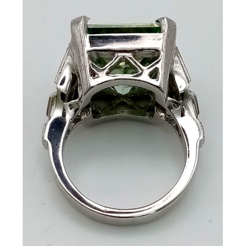 1495 - A 12ct Princess Cut Blue Moissanite Ring set in 925 Silver.
Size Q. 13.2g