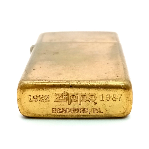 1496 - A Vintage Solid Brass Zippo Lighter. 5.5 x 3cm.