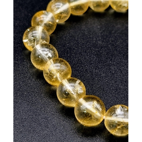 1499 - A Yellow Citrine Quartz and a Chrysocolla Expandable Gemstone Bracelet. 10mm beads.