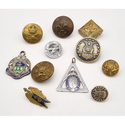 1167 - A Small Collection of Vintage and Antique Military Badges and Buttons. Eleven items in total.