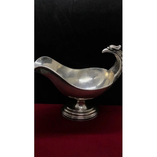 816 - A rare antique large solid silver German bird handled gravy boat pot c1920
Size

Length. :: 19.7 cm
... 