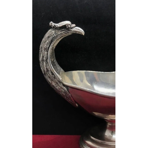 816 - A rare antique large solid silver German bird handled gravy boat pot c1920
Size

Length. :: 19.7 cm
... 