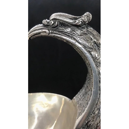 816 - A rare antique large solid silver German bird handled gravy boat pot c1920
Size

Length. :: 19.7 cm
... 