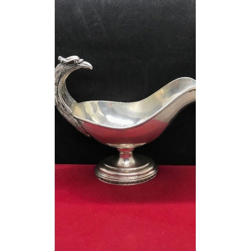 816 - A rare antique large solid silver German bird handled gravy boat pot c1920
Size

Length. :: 19.7 cm
... 