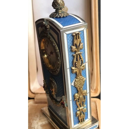 935 - A Russian silver and enamel diamond miniature clock 

HEIGHT ::: 10.7 cm

Length&width. :::: 4.9 by ... 