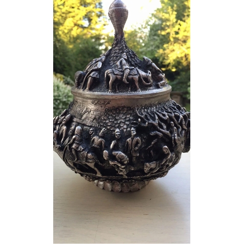 1084 - A large early 20th century extraordinary Persian Islamic solid silver lidded bowl 


Outstanding car... 