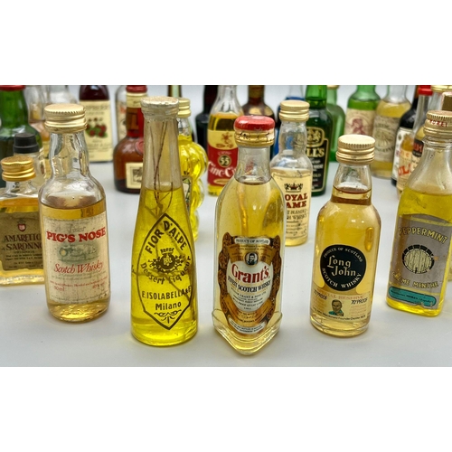 1268 - A selection of 30 assorted of miniature bottles of booze. See pictures for more info.