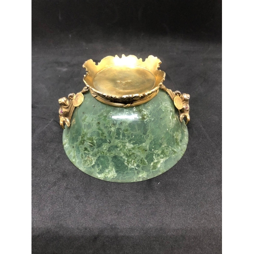 1015 - STUNNING SOLID SILVER SPINACH JADE DIAMOND BOWL.

Stunning bowl with bulls heads either side hanging... 