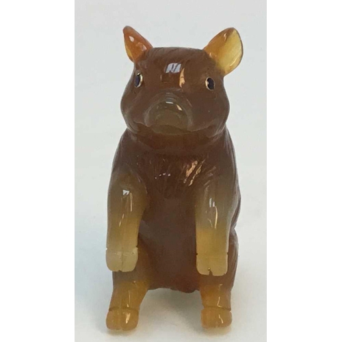 1039 - RUSSIAN 14k GOLD CARVED AGATE HARDSTONE MODEL OF A PIG,
20th century, upright, the eyes set with blu... 