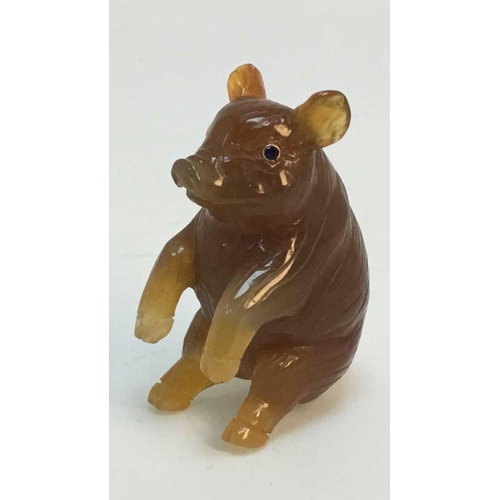 1039 - RUSSIAN 14k GOLD CARVED AGATE HARDSTONE MODEL OF A PIG,
20th century, upright, the eyes set with blu... 